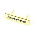 Étiquette « Handmade » en écriture cursive